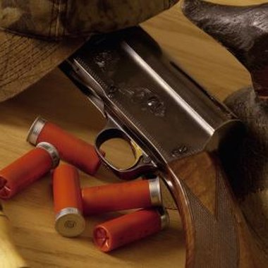 Jupiterimages/liquidlibrary/Getty Images Pheremone spray along with hunting calls will increase odds of attracting prey.