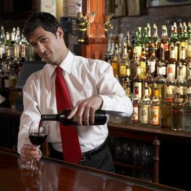 Allen Simon/Digital Vision/Getty Images Let your guests know if you're only serving light refreshments.