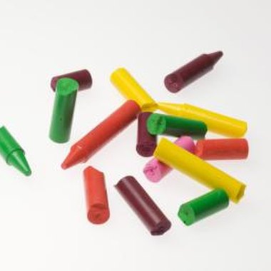 Jupiterimages/liquidlibrary/Getty Images Rescue broken crayons from a non-productive life by recycling them as candles.