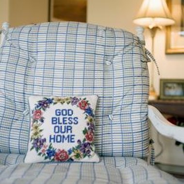 Jupiterimages/liquidlibrary/Getty Images Cross stitched items are often made into pillows or framed as wall art.