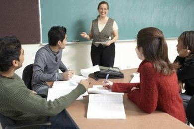 Jupiterimages/Photos.com/Getty Images College level teaching comes with specific educational requirements, but rewards you with a dynamic career.