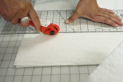 Cut batting squares.