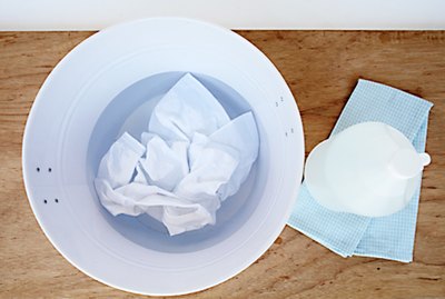 Soak shirt in water and vinegar