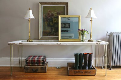 Charm visitors at the door with a unique entry table.