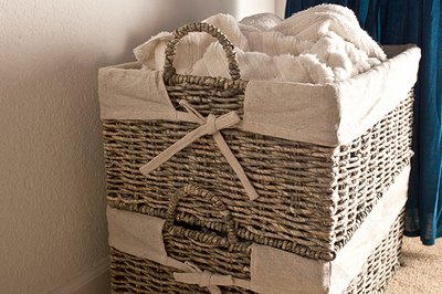 Stack hamper baskets to save space and separate laundry by color or type.