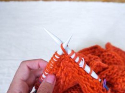 Knit into the front and back of the stitch.