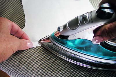Press a casing into the sleeve hems.