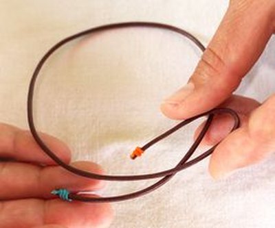 Bend one end of the cord.