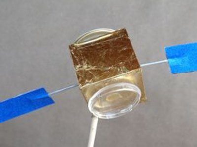 A clear plastic piece makes a lens.