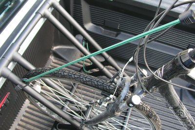 Bike secured in the rack with bungee cord.