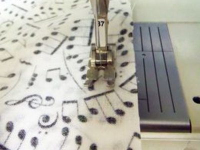 Sew seams.