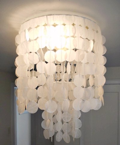 Wax-paper capiz shells look a lot like the real thing on this DIY chandelier.