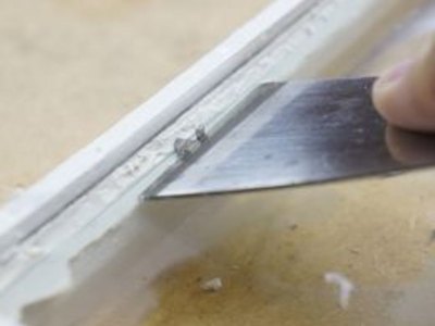 Install glazier's points.