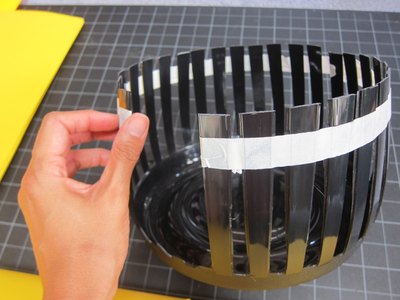 Tape the basket so it doesn't flare.