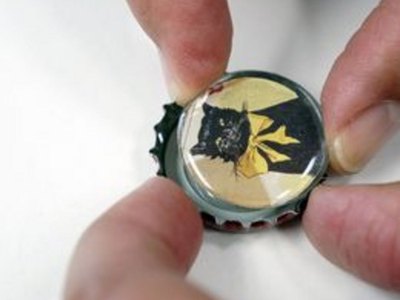 Press into adhesive for a good seal.