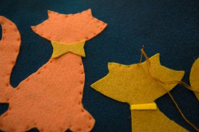 Secure appliqué with a running stitch (or stitch of your choice).