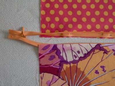 Attach the opposite side of the zipper.
