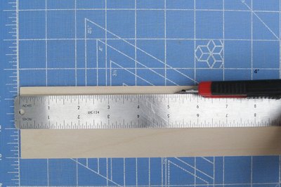 Cut strips of wood.