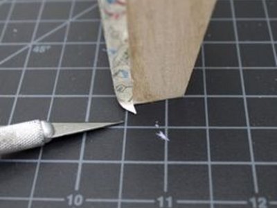 Trim excess paper.