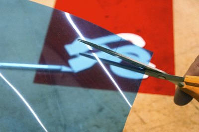 Cut lenses from acetate.