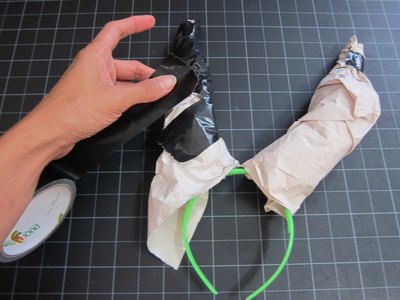 Cover newspaper with duct tape.