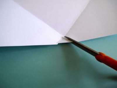 Cut the triangle area out of the paper.