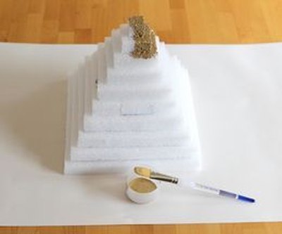 Paint your pyramid with gold paint.