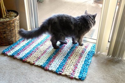 The finished rag rug is a pretty accent for high-traffic areas in your home.