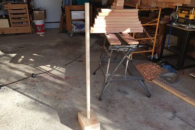 Once sanded, the closet pole should slide easily into the base.