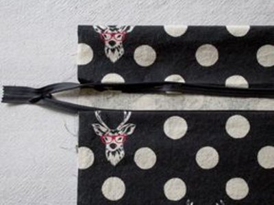 Attach the other side of the zipper.