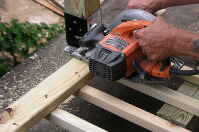 Cut between balusters or remove one according to your measurements.