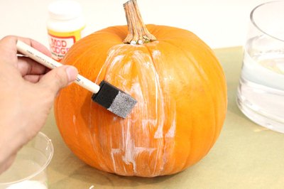 Apply decoupage medium to one section