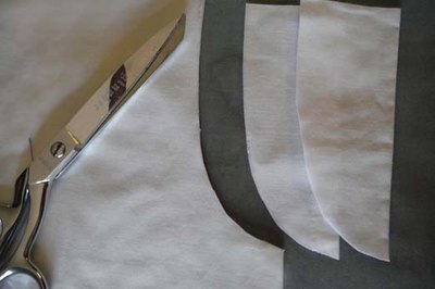 Cut the armholes.