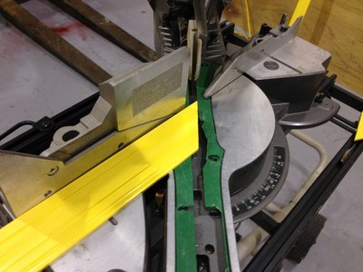 Using a miter saw, cut the casing in a 45 degree angle.