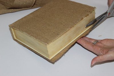 Brush on glue on the edges before cutting.
