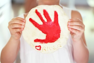 Clay handprints create charming keepsakes.