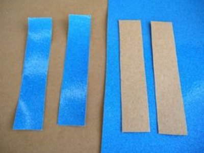 Cut glittered cardstock strips to size.
