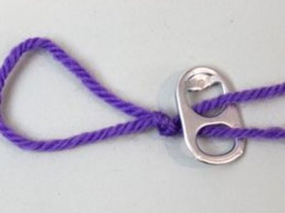 Thread string through the first tab