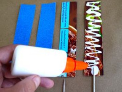 Glue cardboard and glittered cardstock together