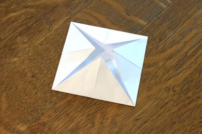Turn over and fold to center again.