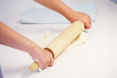 Roll out the dough on a floured board.