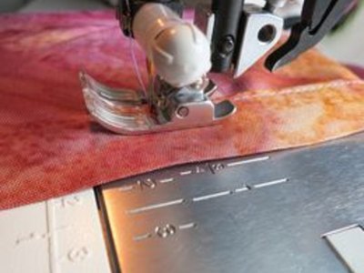 Sew the hemline.