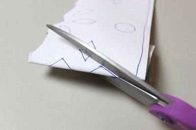 Fold paper to cut interior shapes