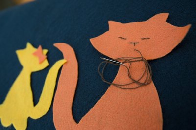 Add your embellishments before attaching your appliqué onto your skirt.