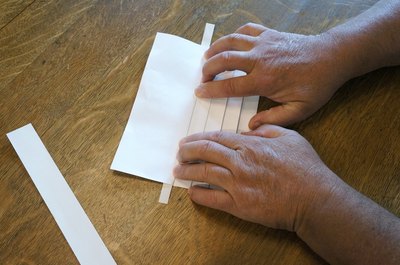 Alternate folds creating pleats.