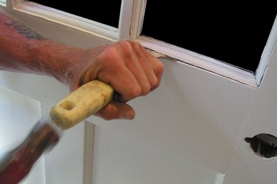 Tap gently so that you don't break the trim.