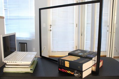Position the plexiglass frame at a 45 degree angle