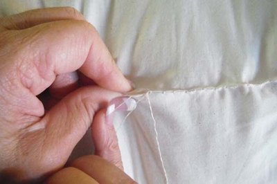 Hand stitch the seam closed.
