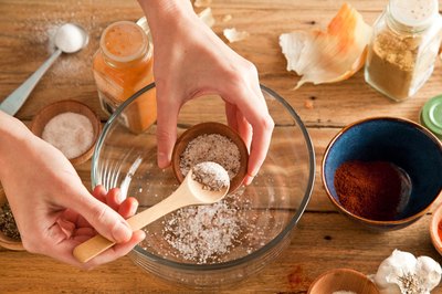 Granulated garlic, salt, paprika and onion in a mixing bowl.