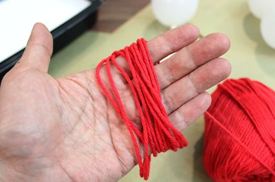 Cut off a piece of yarn